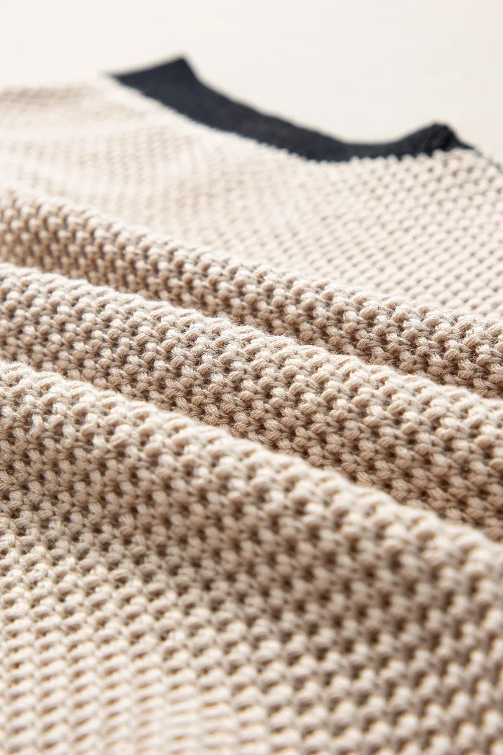 Textured Knit Sweater with Contrast Trim Details.