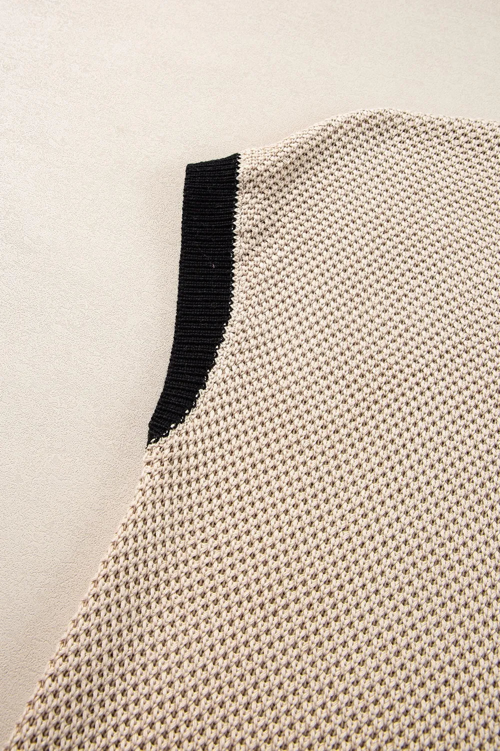Textured Knit Sweater with Contrast Trim Details.